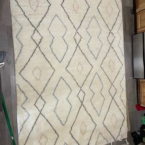 Custom 1 of a kind, hand loomed rugs from India.  They are 100% wool.